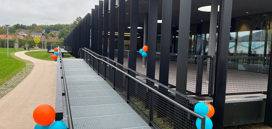 The entrance to the House for Youth and Family is decorated with colourful balloons for the inauguration.