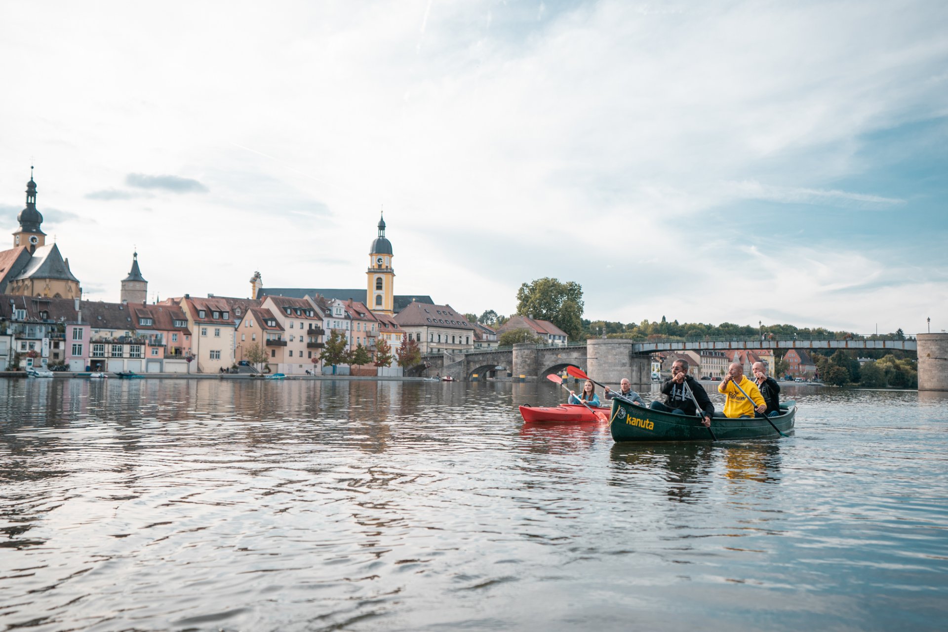 2 canoes travelling side by side on the Main