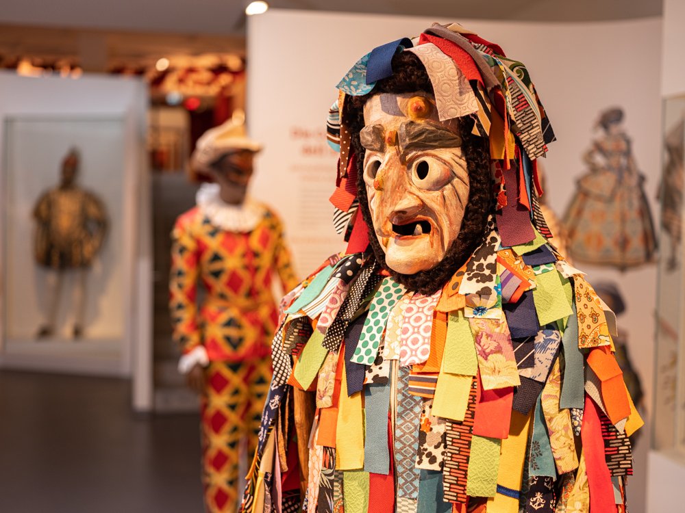 Colourfully dressed carnival figures