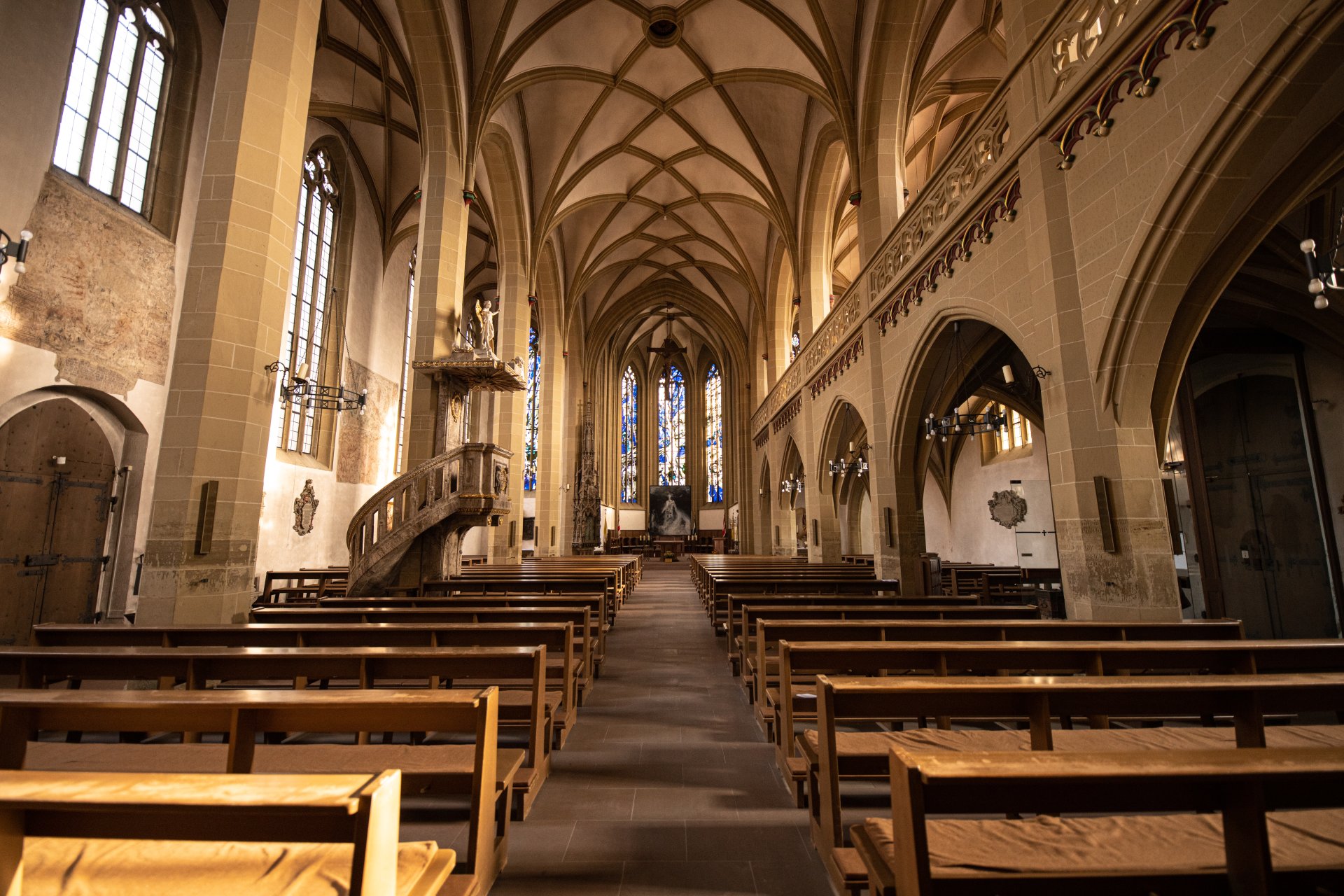 Catholic church - St John inside St John's Catholic Church from the inside, view of the passageway with benches, altar and pulpit
