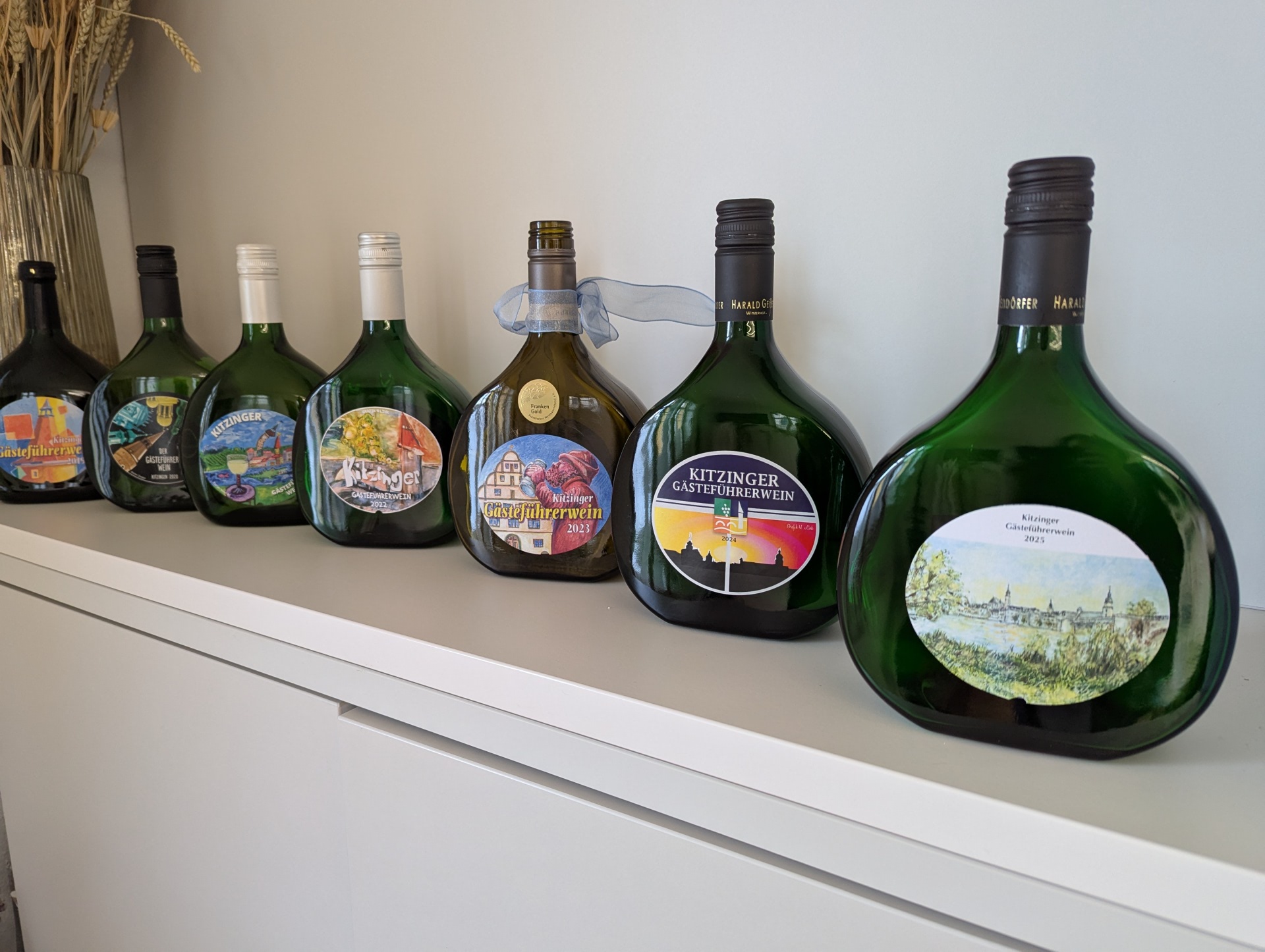 Tour guide wines from 2019-2025 You can see 7 Bocksbeutel with different coloured labels