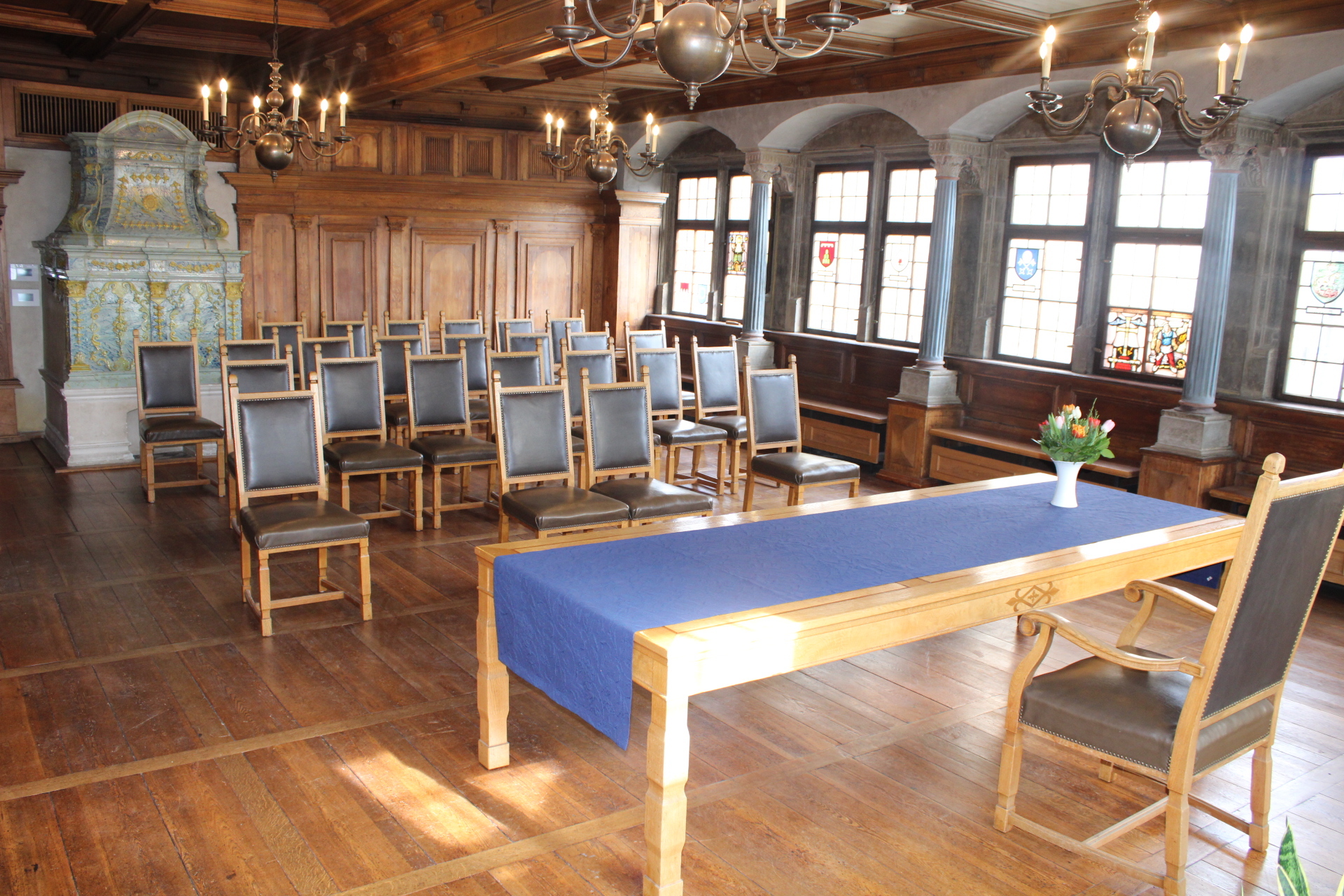 Historic wedding hall in Kitzingen town hall. Seated and decorated for a wedding ceremony.