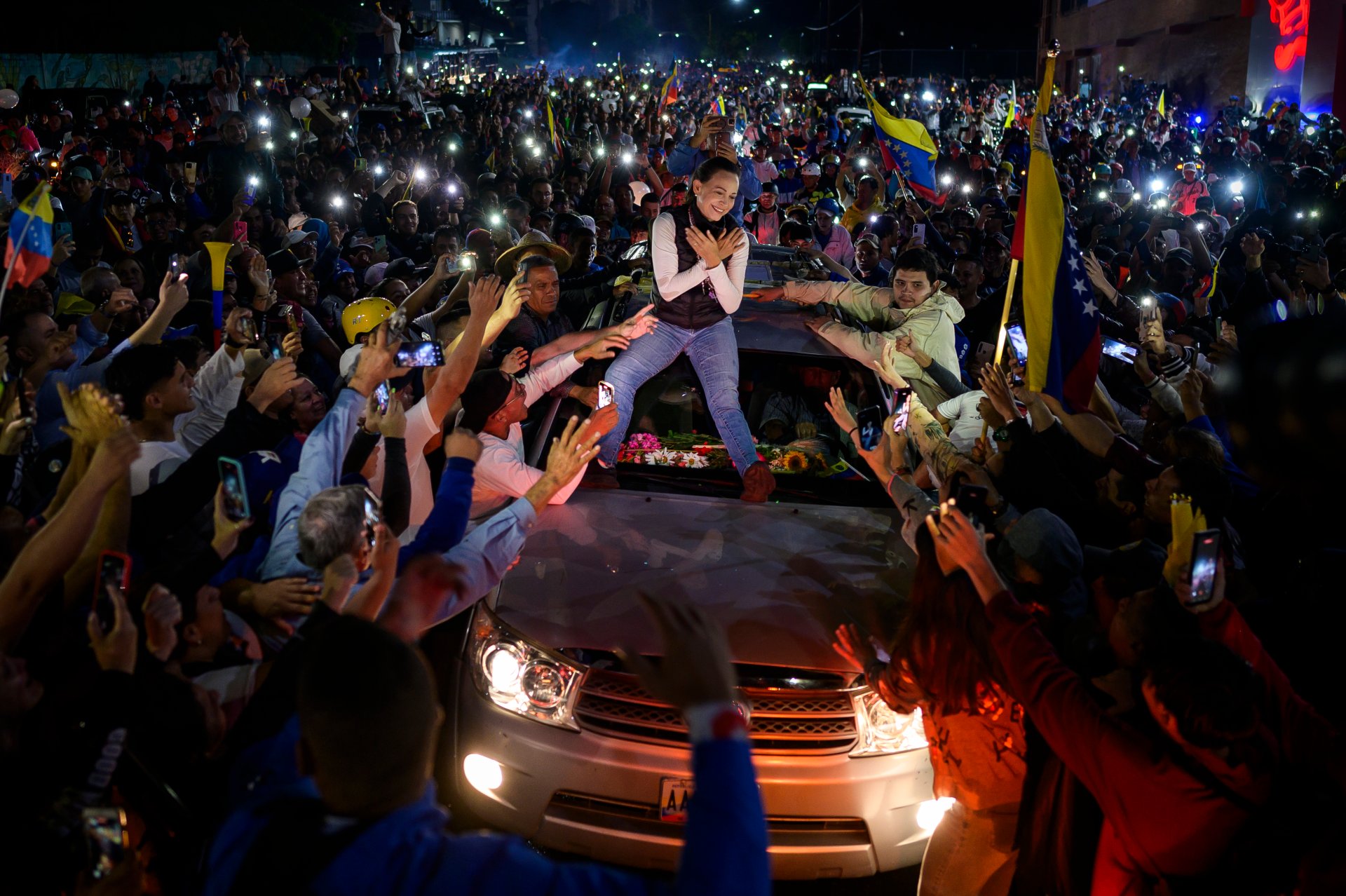The last hope Venezuelan opposition leader María Corina Machado greets supporters on a vehicle during a campaign rally for opposition presidential candidate Edmundo González Urrutia in Mérida, Venezuela.